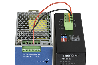 Image 02: Tops of power supply (DC output) and switch with both red and black wires connected