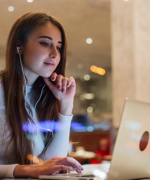 A person looking at a computer.