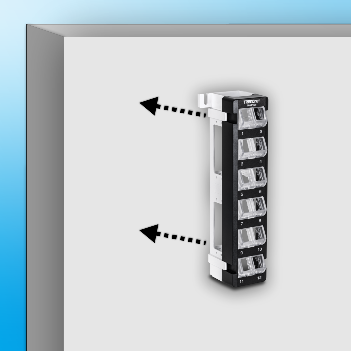 Keystone Patch Panel with arrow going on a wall.