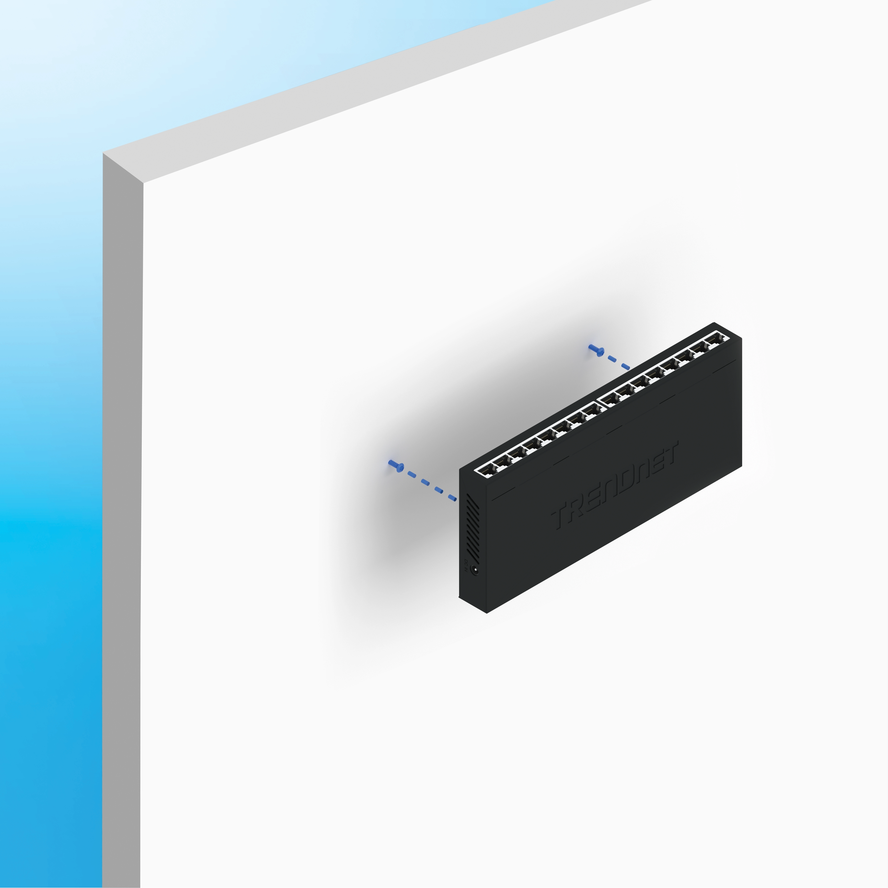 Black TRENDnet network switch mounted on a white vertical surface with multiple Ethernet ports aligned in a single row on the top edge. Two blue screws with dashed lines indicate mounting points on either side of the switch. Minimalist instructional layout with white background and clean visual emphasis on wall-mounting configuration.