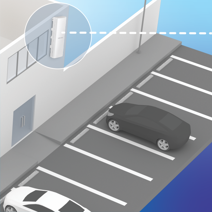 Directional PoE Access Point mounted on a building wall, overseeing a parking lot with parked cars.