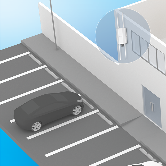 Outdoor PoE+ Omni-Directional Access Point mounted on a building wall, overseeing a parking lot with parked cars.