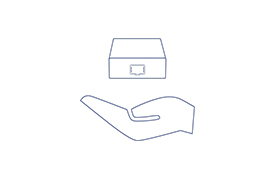 A hand emphasizing the small size of the Fiber Media Converter.