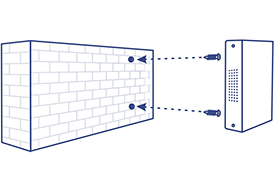 A brick wall is on the left side with two mounting holes, one above the other. On the right side, there's a rectangular metal enclosure with ventilation holes on its side. Two screws are shown, indicating the method of attachment to the brick wall using the mounting holes.